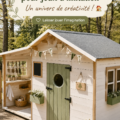Une cabane pour enfants colorée dans un coin de jardin, prête à accueillir des jeux d'imitation.