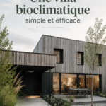 Vue d'une belle villa bioclimatique intégrée dans la nature, avec des matériaux écologiques.