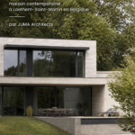 Vue extérieure de la villa C à Laethem-Saint-Martin, mettant en avant son architecture contemporaine.