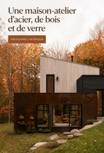 Une maison-atelier moderne en acier, bois et verre avec une grande fenêtre laissant passer la lumière.
